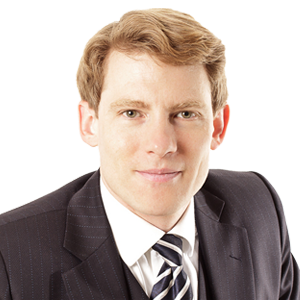 Headshot of Prof. Dr Mark Oliver Mackenrodt, a middle aged man on a simple white background.