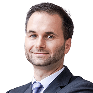 Headshot of Prof. Dr Sebastian Pfotenhauer, a middle aged man smiling on a simple white background.